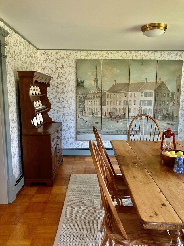 dining area featuring baseboard heating