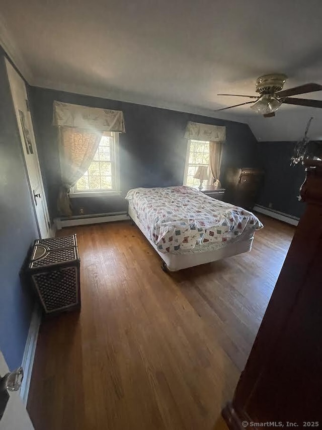 191 Anson St, Stratford, CT 06614 - bedroom featuring ceiling fan, baseboard heating, lofted ceiling, and hardwood / wood-style flooring