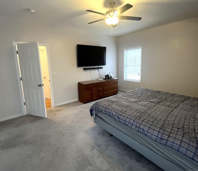 bedroom featuring ceiling fan and carpet floors