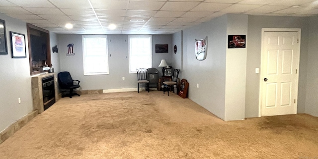 living area featuring carpet