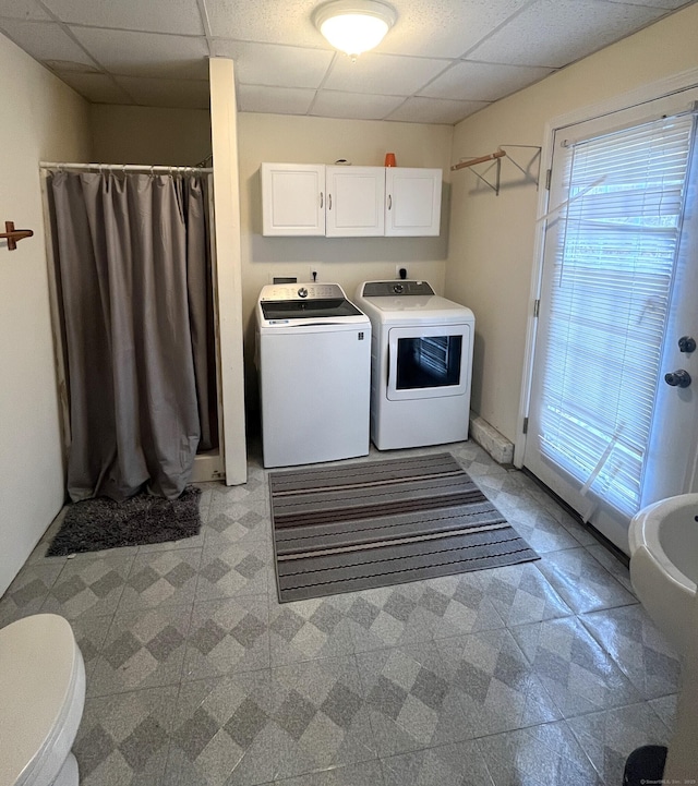 clothes washing area with independent washer and dryer