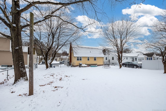 view of yard covered in snow