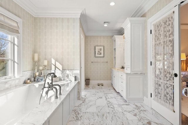 bathroom with wallpapered walls, visible vents, ornamental molding, a garden tub, and vanity