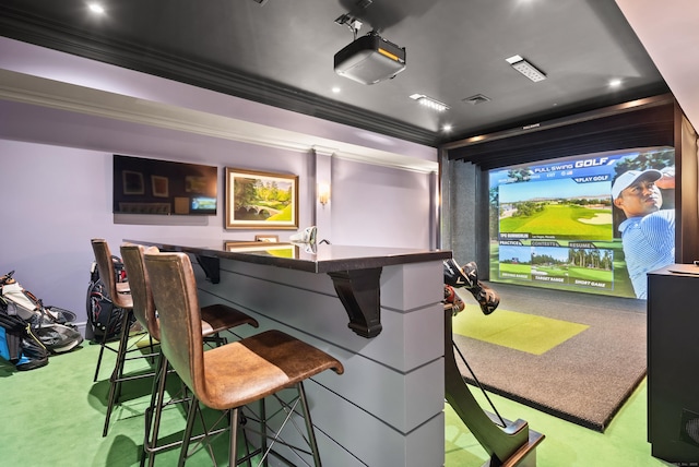 cinema room featuring a bar, recessed lighting, golf simulator, and ornamental molding