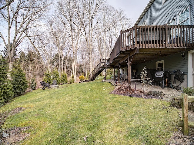 view of yard featuring a wooden deck