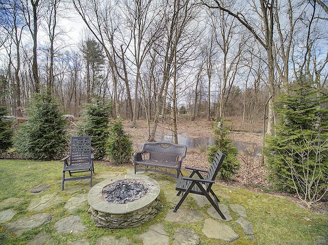 view of patio / terrace featuring a fire pit