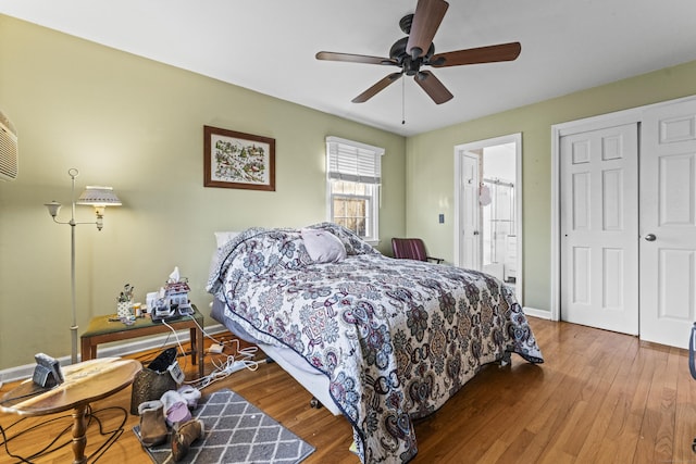 bedroom featuring ceiling fan and hardwood / wood-style flooring