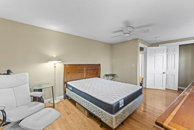 bedroom featuring ceiling fan and light wood-type flooring