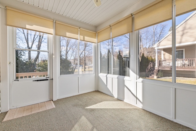 unfurnished sunroom featuring a healthy amount of sunlight