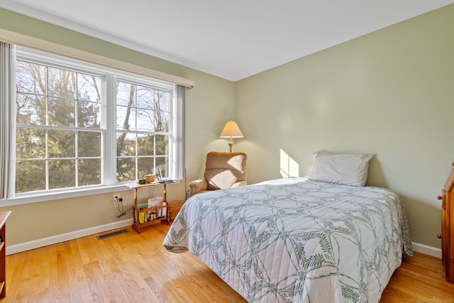 bedroom featuring light hardwood / wood-style floors