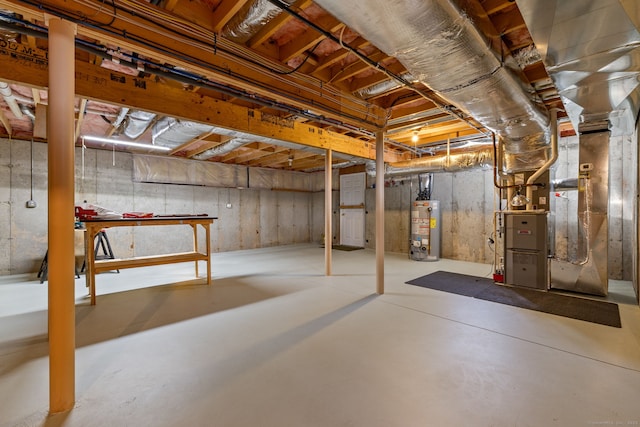 basement with heating unit and water heater