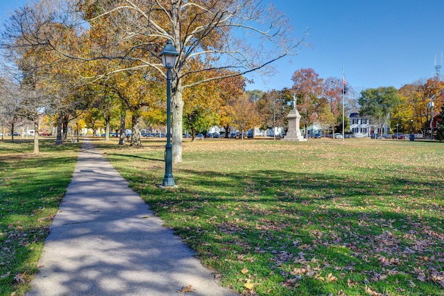 view of home's community featuring a lawn