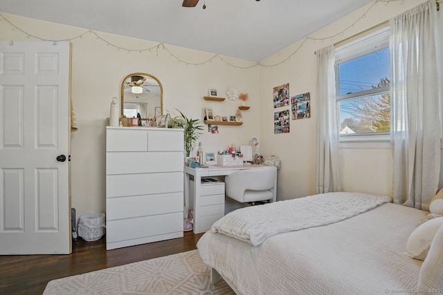 bedroom featuring dark hardwood / wood-style flooring and ceiling fan