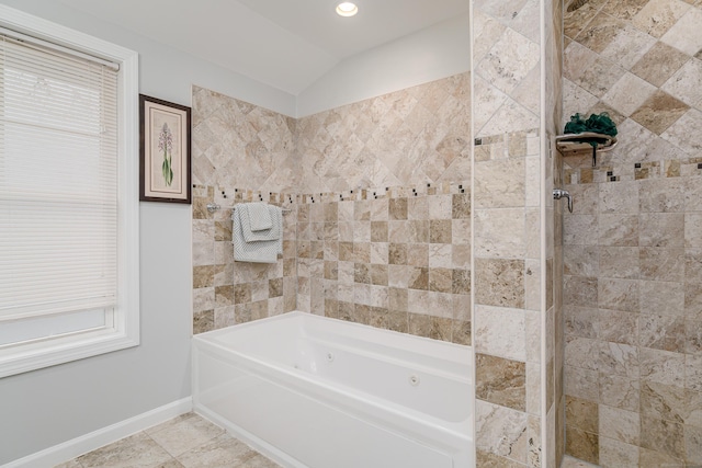 bathroom featuring tile patterned flooring, independent shower and bath, and vaulted ceiling