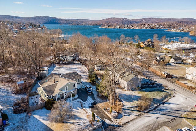 aerial view featuring a water and mountain view