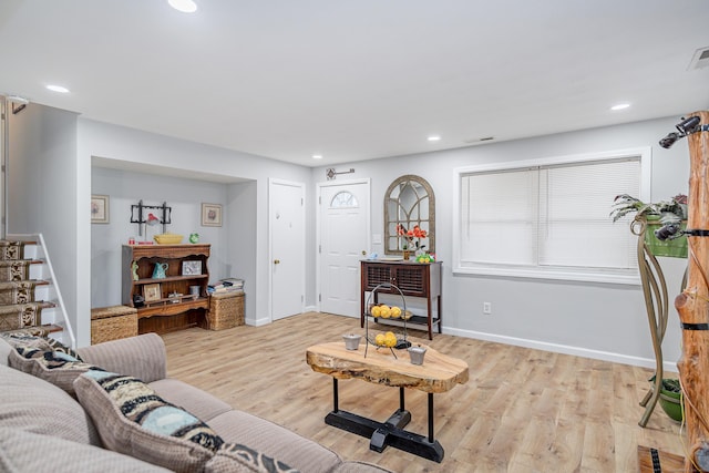 living room with light hardwood / wood-style floors