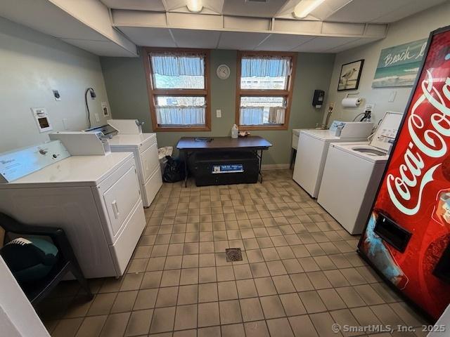 laundry room with washing machine and dryer