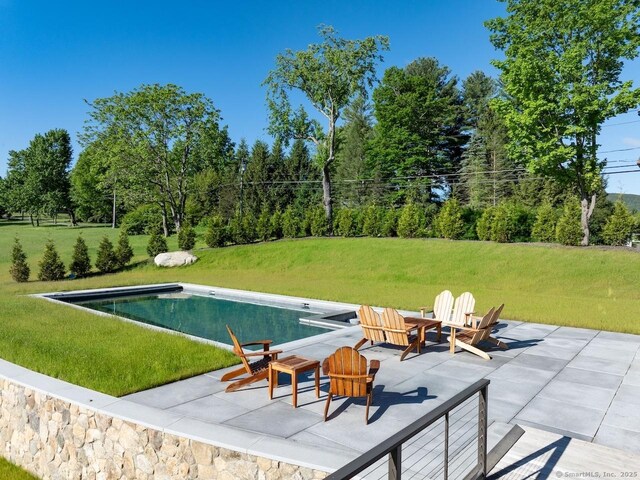 145 Taconic Rd, Salisbury, CT 06068 - swimming pool with a patio, a yard, and view of scattered trees