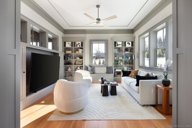 145 Taconic Rd, Salisbury, CT 06068 - living area with plenty of natural light, wood finished floors, ceiling fan, and ornamental molding