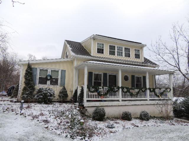 view of front facade featuring covered porch