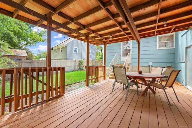 deck featuring a yard