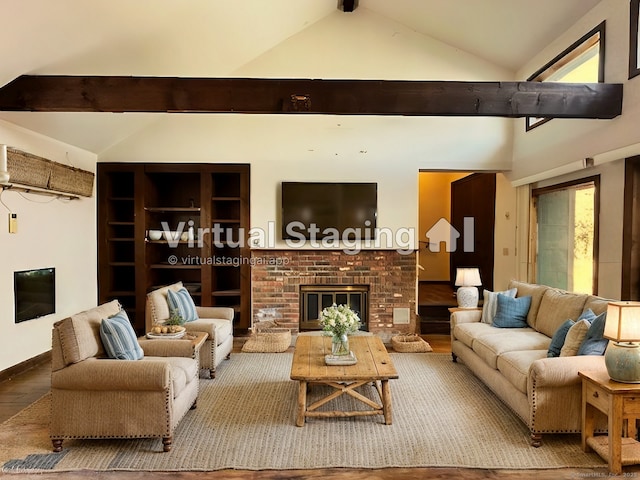 living room with built in shelves, a fireplace, and lofted ceiling with beams