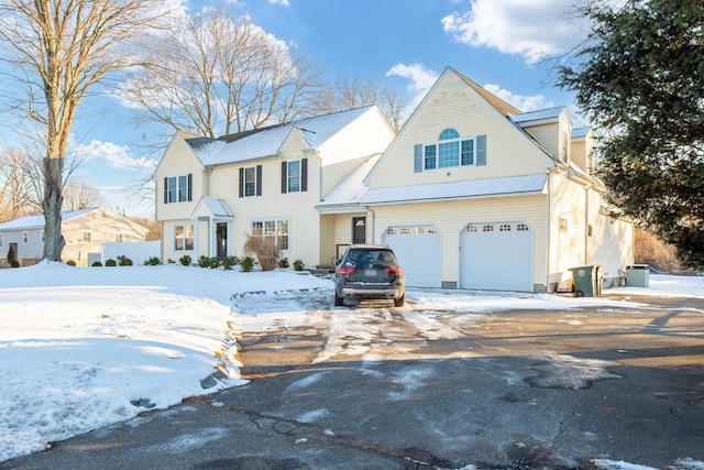 view of front of property featuring a garage