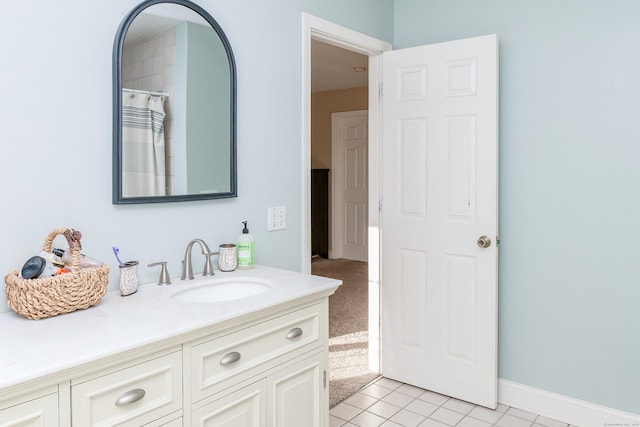 bathroom with vanity and tile patterned floors