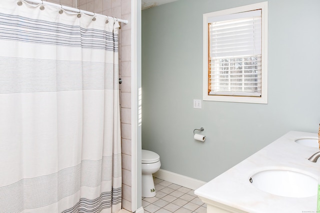 bathroom with a shower with curtain, tile patterned floors, vanity, and toilet