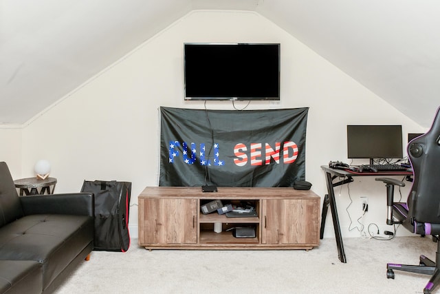 living room with vaulted ceiling and carpet