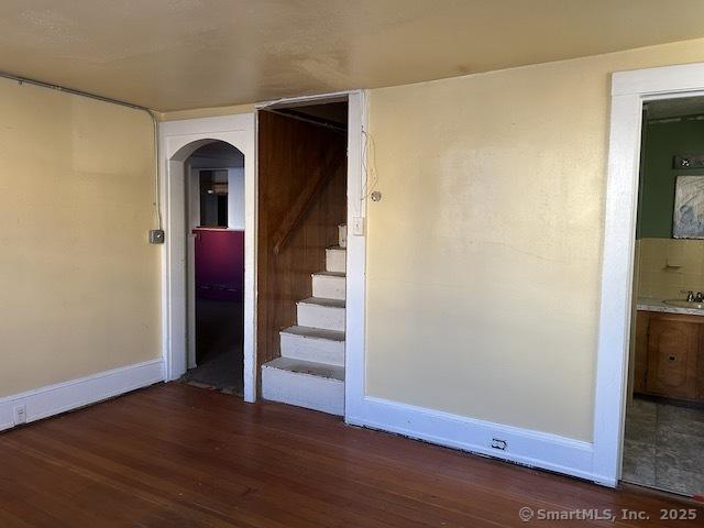 interior space with wood-type flooring and sink