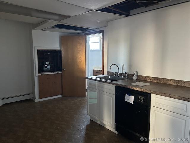 kitchen featuring dishwasher, white cabinetry, sink, and baseboard heating