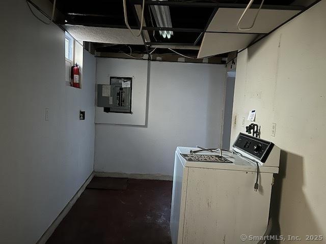 laundry area with washer / clothes dryer and electric panel