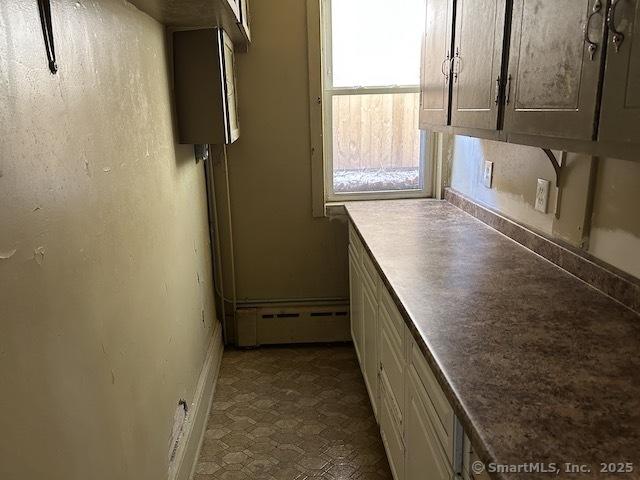 kitchen with a baseboard heating unit