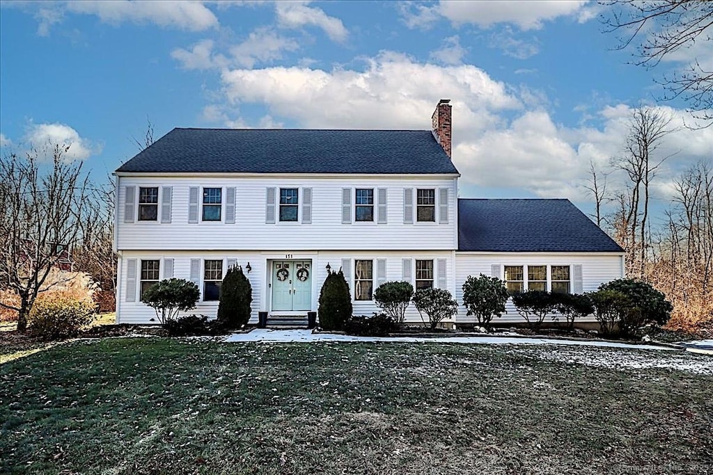 colonial house with a front yard