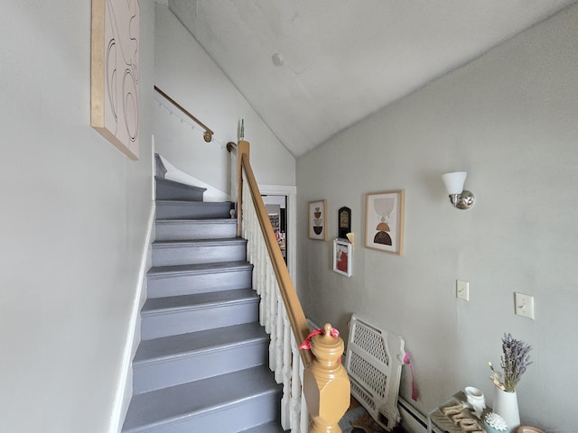 stairs with lofted ceiling