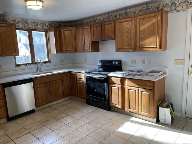 kitchen featuring dishwasher, light tile patterned floors, black range with electric stovetop, and sink