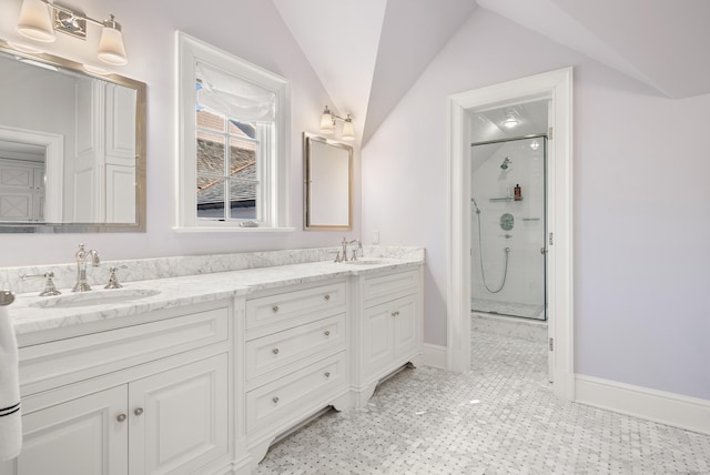 bathroom with vanity, an enclosed shower, and lofted ceiling