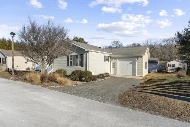 view of property exterior with a garage