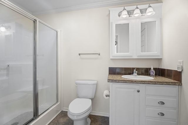 bathroom with tile patterned floors, crown molding, toilet, vanity, and a shower with shower door