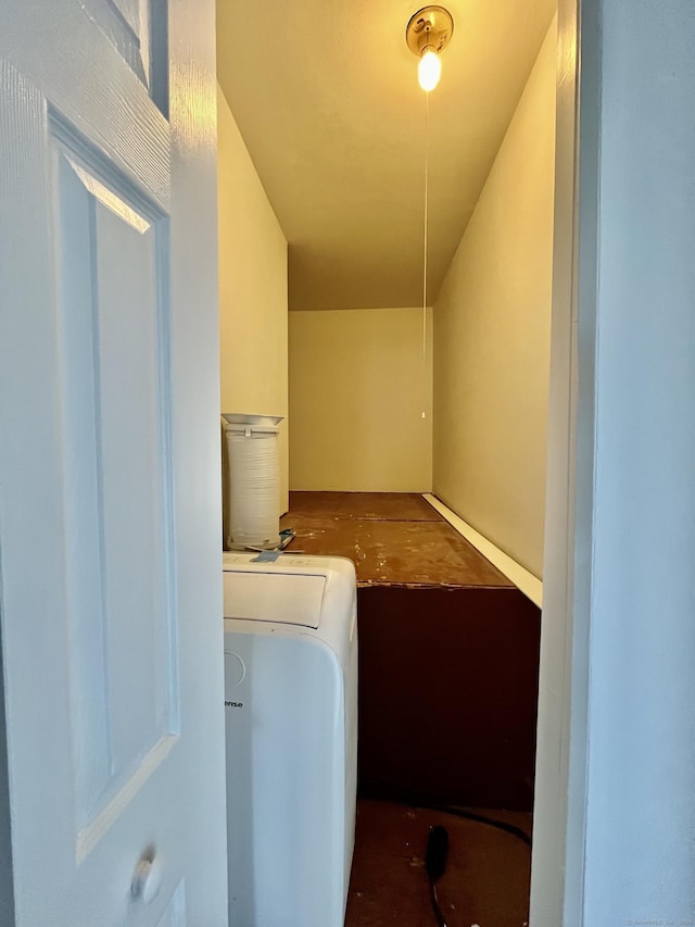 clothes washing area featuring washer / clothes dryer