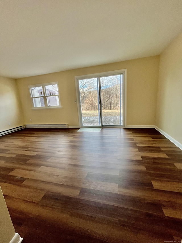 empty room featuring dark hardwood / wood-style flooring