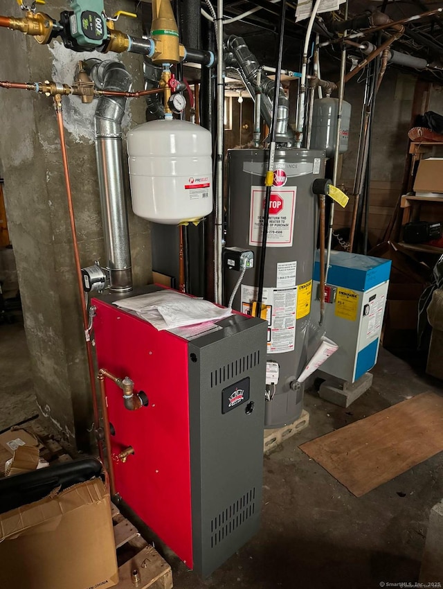 utility room featuring water heater