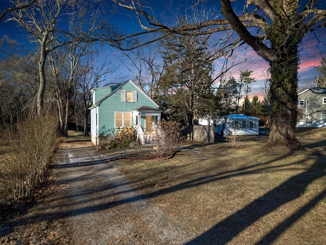 view of front of home featuring a yard