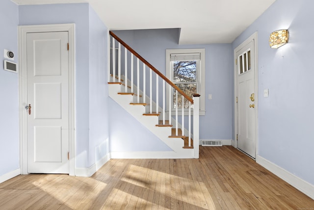 entrance foyer featuring light hardwood / wood-style floors