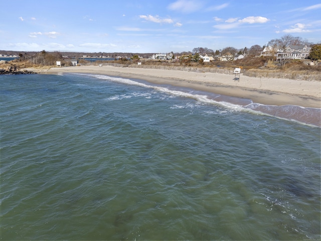 view of water feature with a beach view