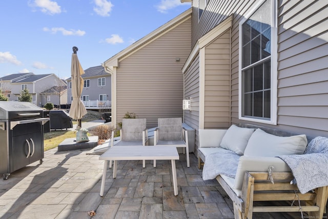 view of patio featuring an outdoor living space and grilling area