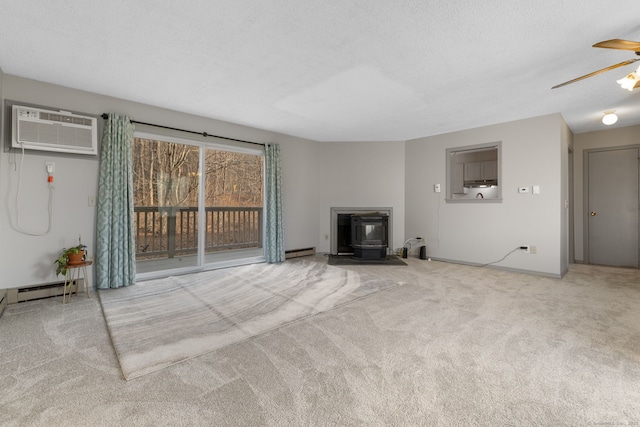 unfurnished living room with light carpet, a wall mounted AC, a wood stove, and a baseboard heating unit