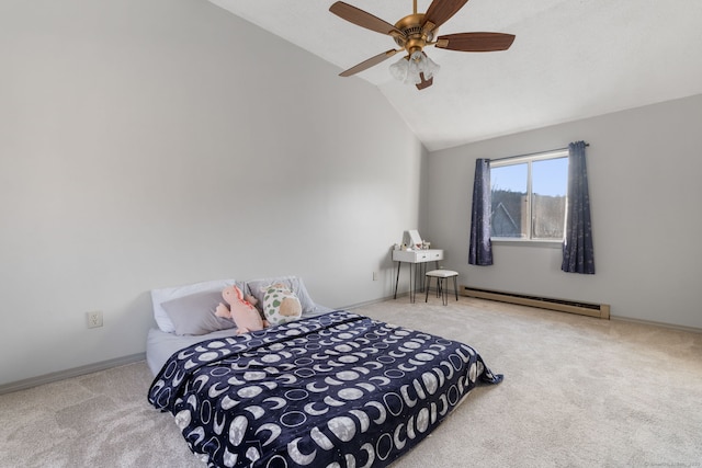 carpeted bedroom with ceiling fan, a baseboard heating unit, and vaulted ceiling