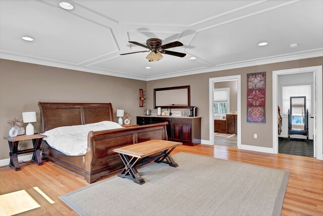 bedroom featuring recessed lighting, baseboards, crown molding, and light wood finished floors